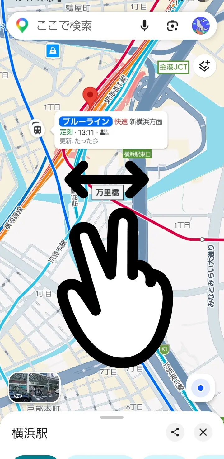 スマホ版Googleマップで画面を2本指で回転させてコンパスを表示する操作画面